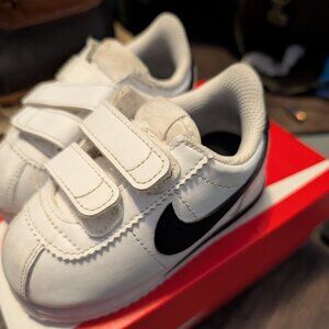 Children's white Nike sneakers
